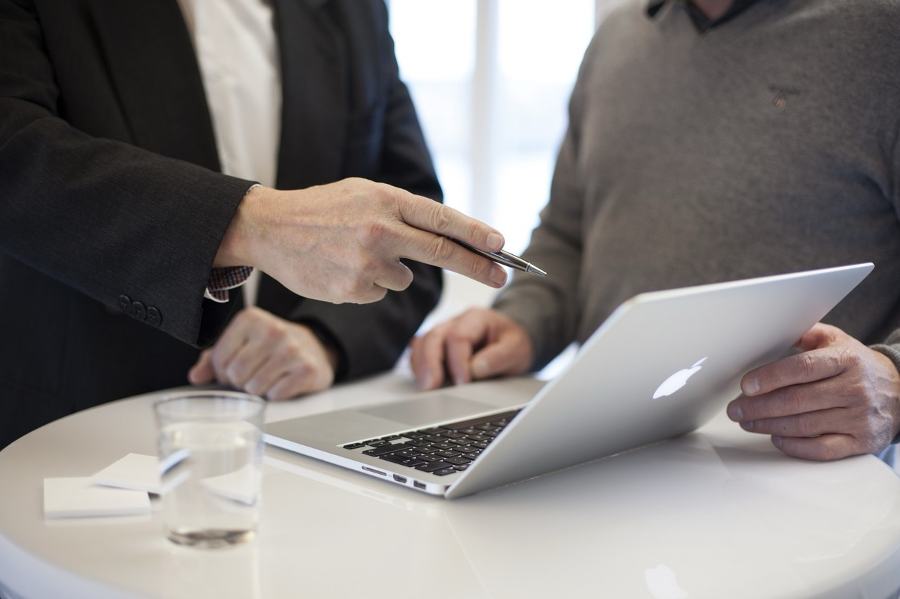 A Professional Businessman is Consulting A Customer