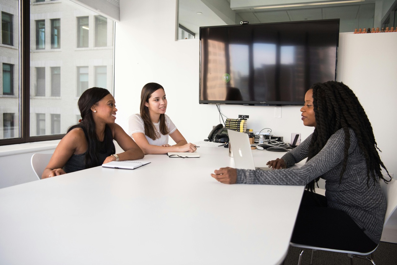 A group of people having a meeting